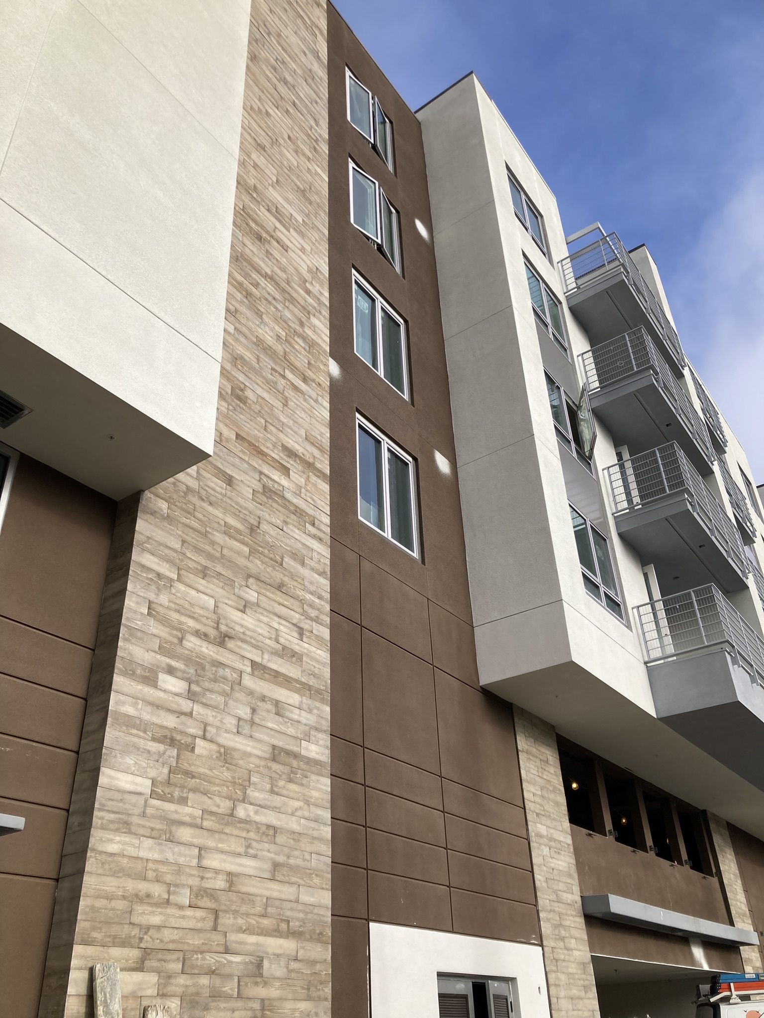 High-rise stone facade masonry project by CMF Masonry