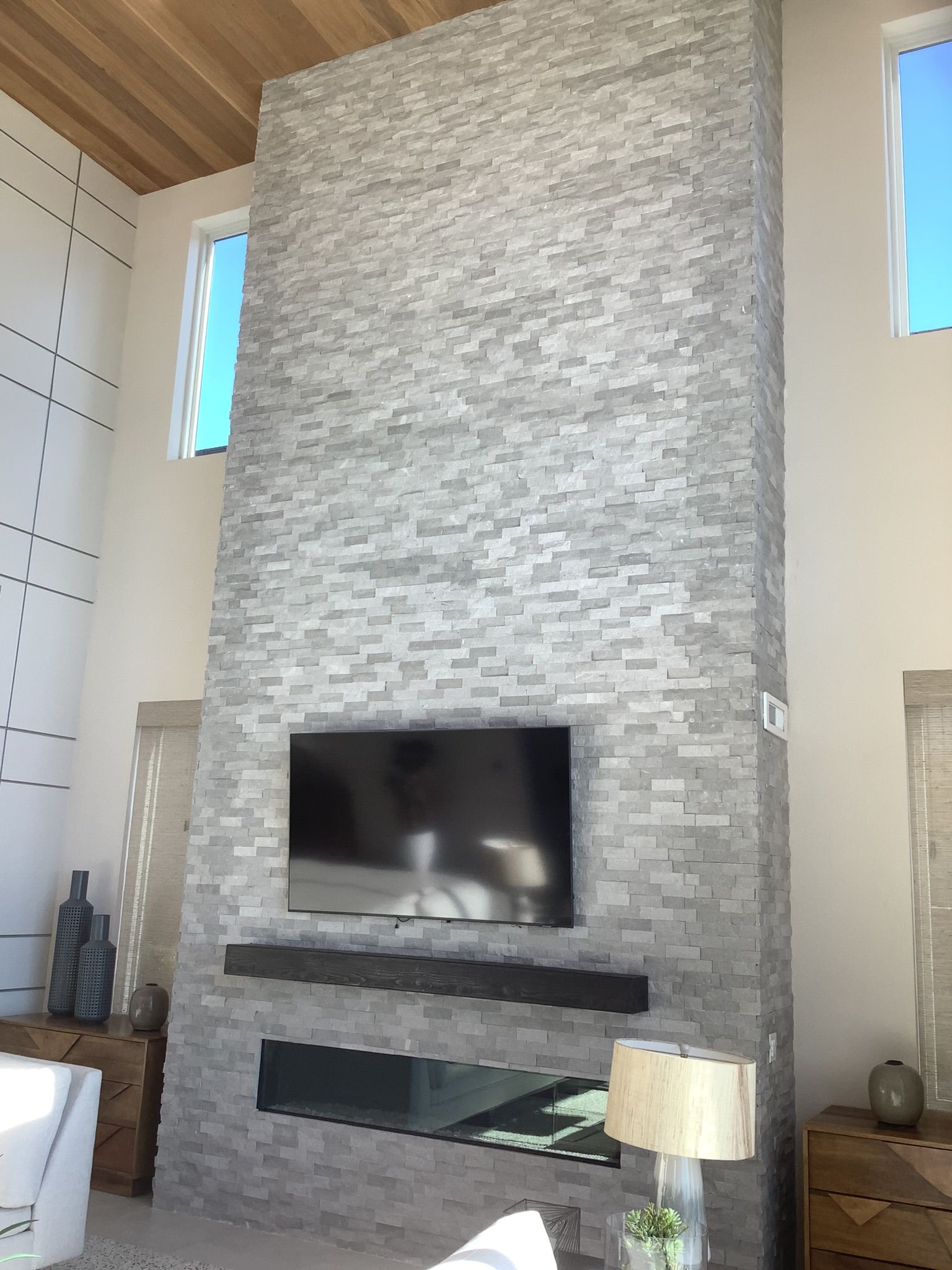 Floor-to-ceiling fireplace by CMF Masonry