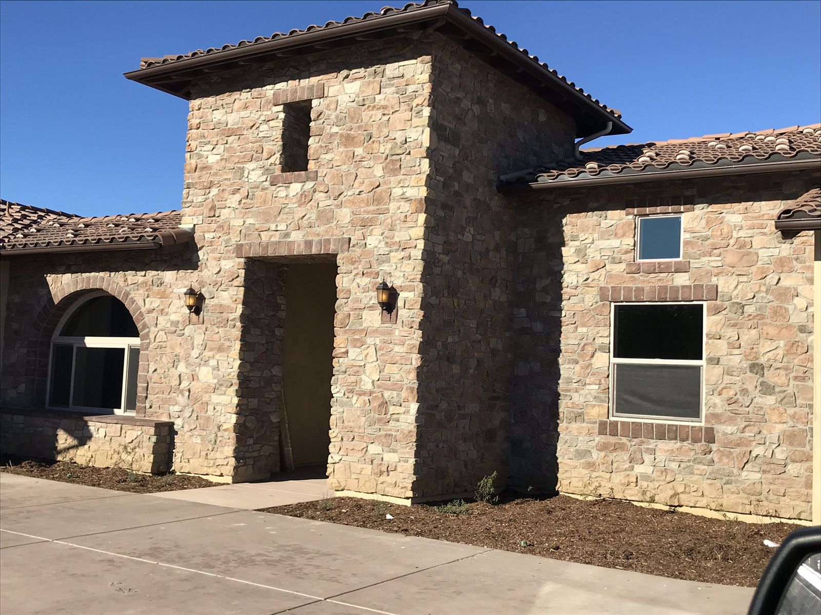 Stone entry tower by CMF Masonry