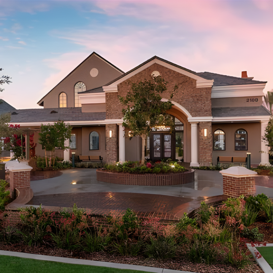 Residential home with landscaped garden and flower beds