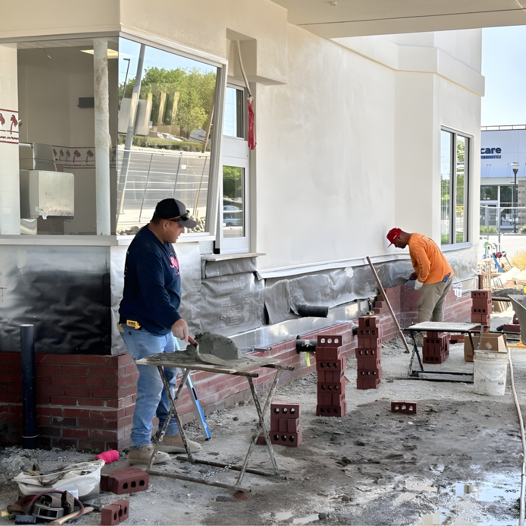 Masonry crew working on commercial exterior