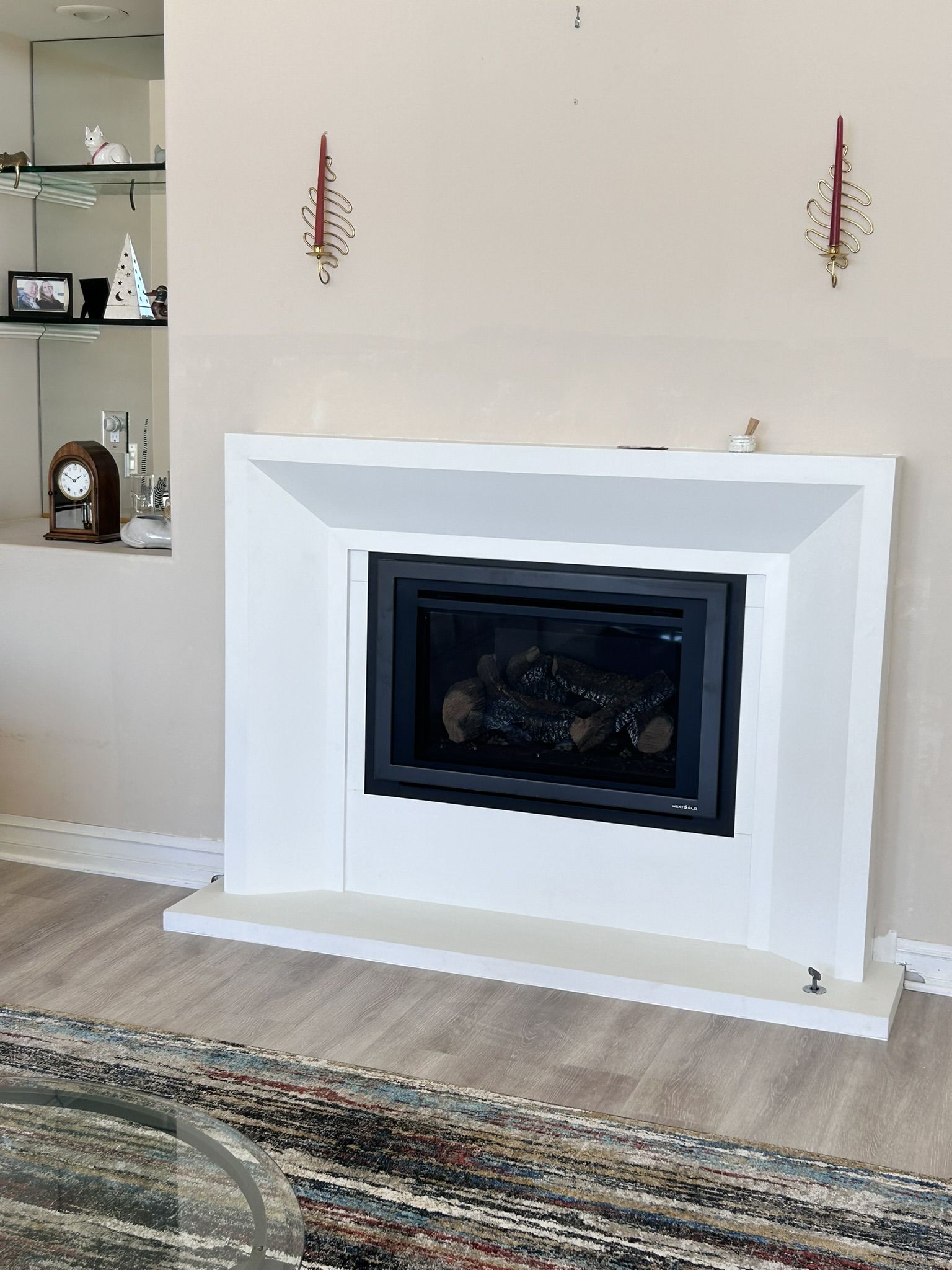 White cast stone fireplace surround