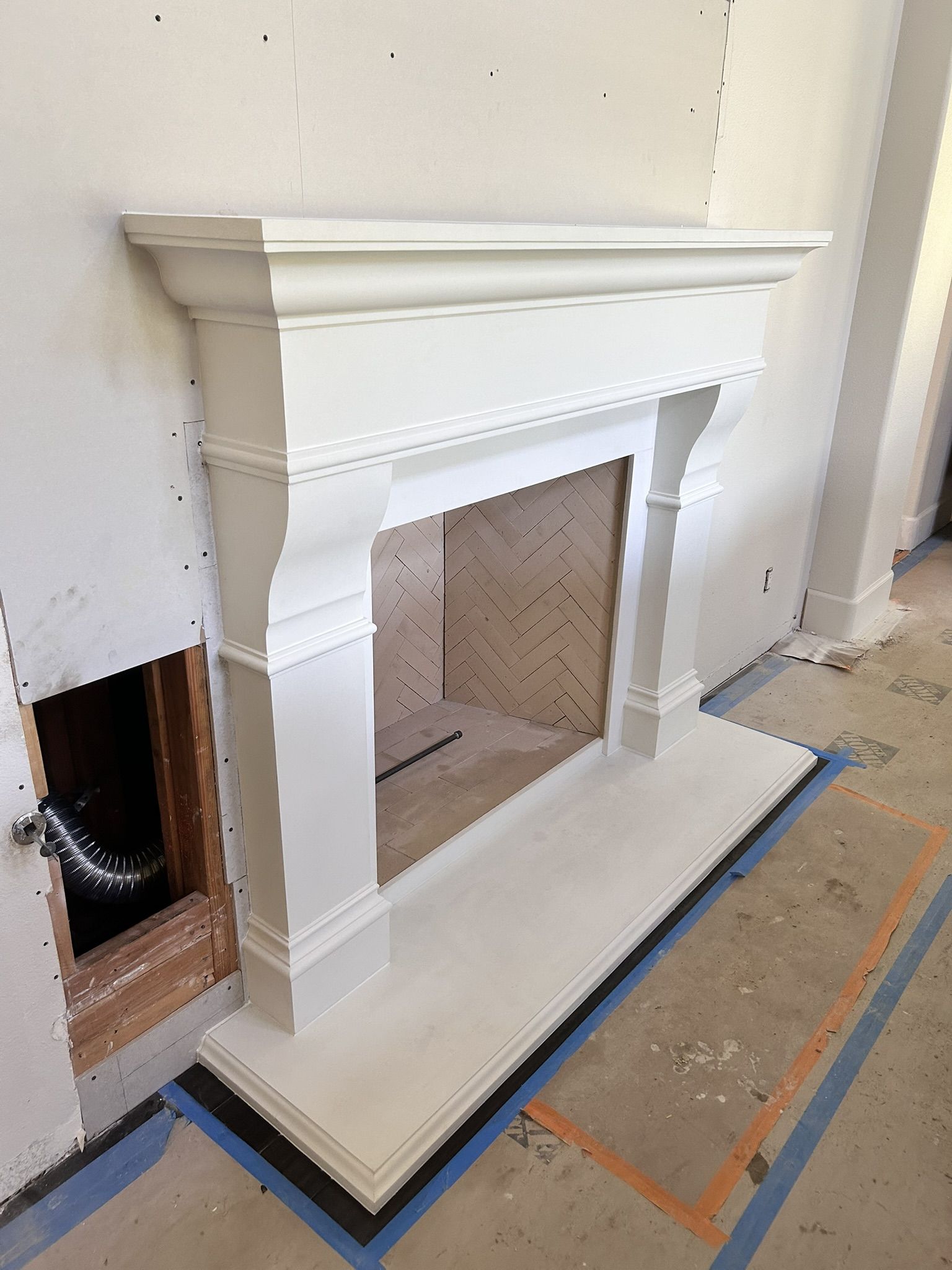Ornate cast stone fireplace surround
