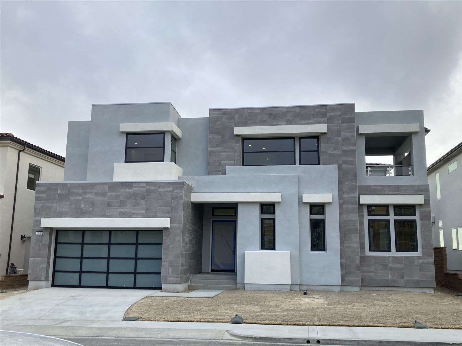 Modern home with stone and stucco elevation