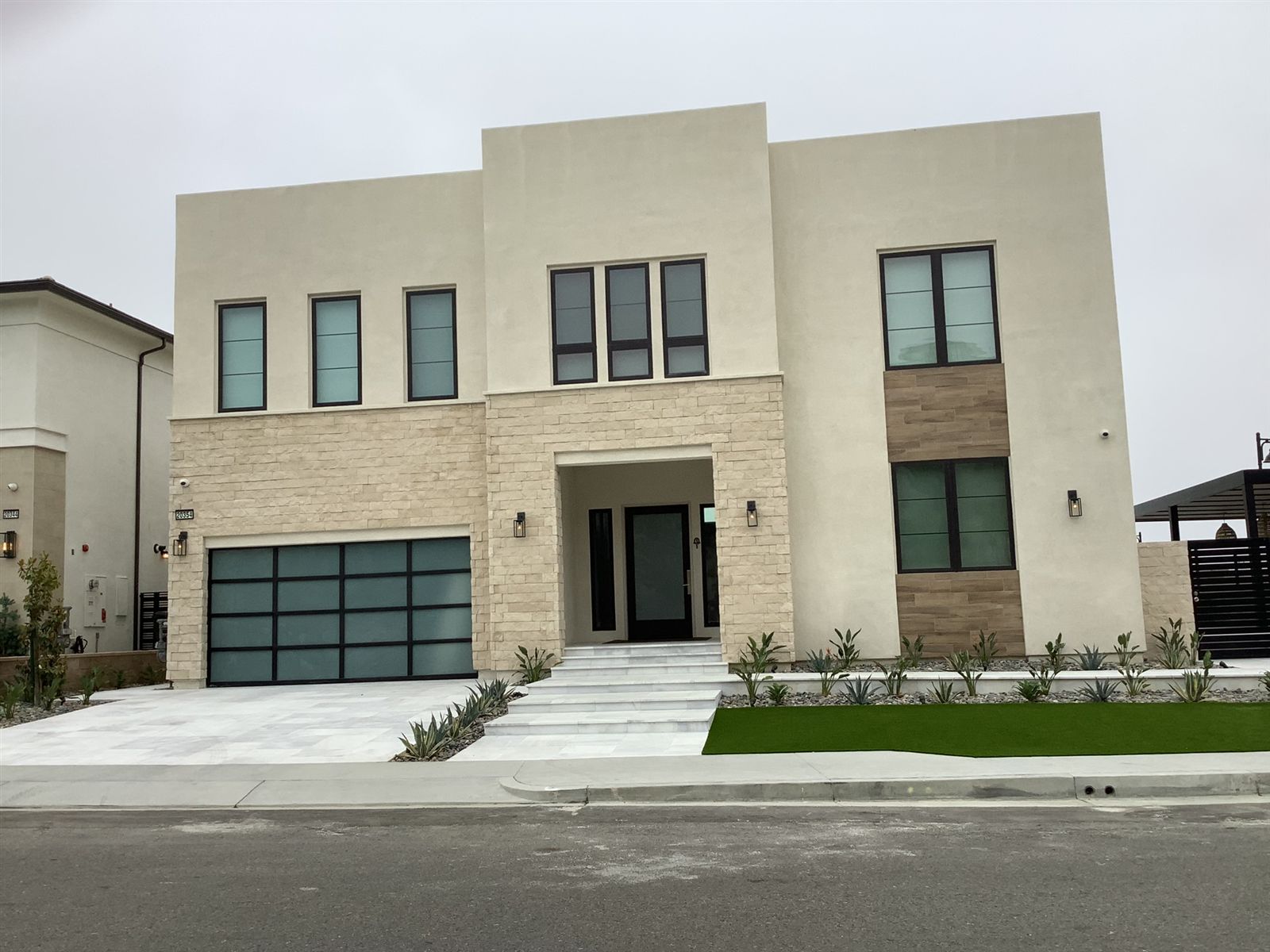 Modern stucco elevation by CMF Masonry